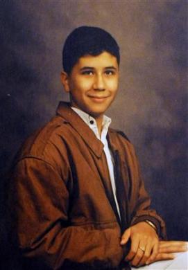 George Zimmerman is pictured in a school photo from 1998 in this handout photo obtained by Reuters April 25, 2012.  REUTERS/Zimmerman Family/Handout. Click to see original image